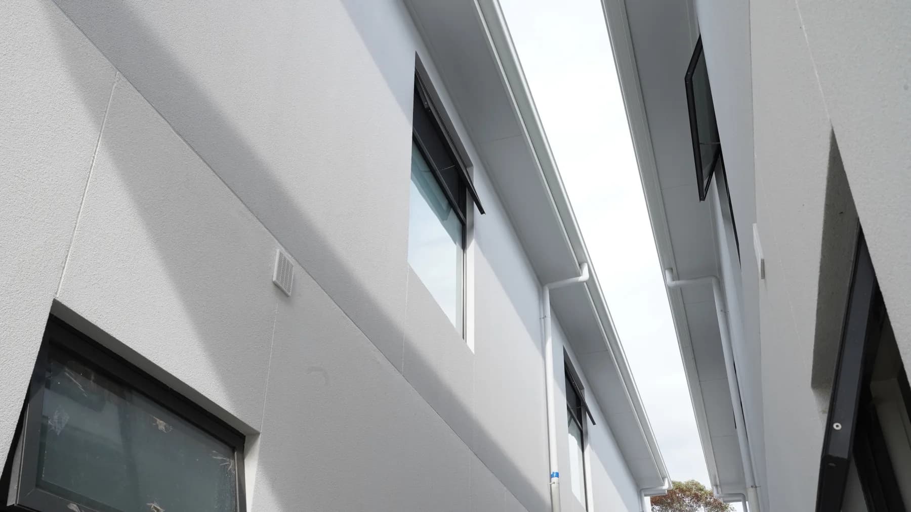 Side elevation awning window detail with dark frames