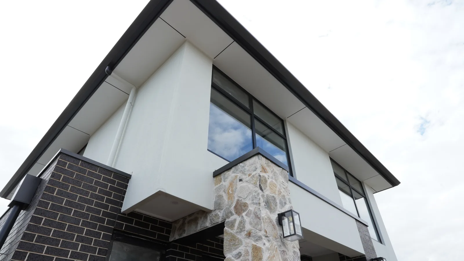 Stone and window detail at a contemporary two-storey residence
