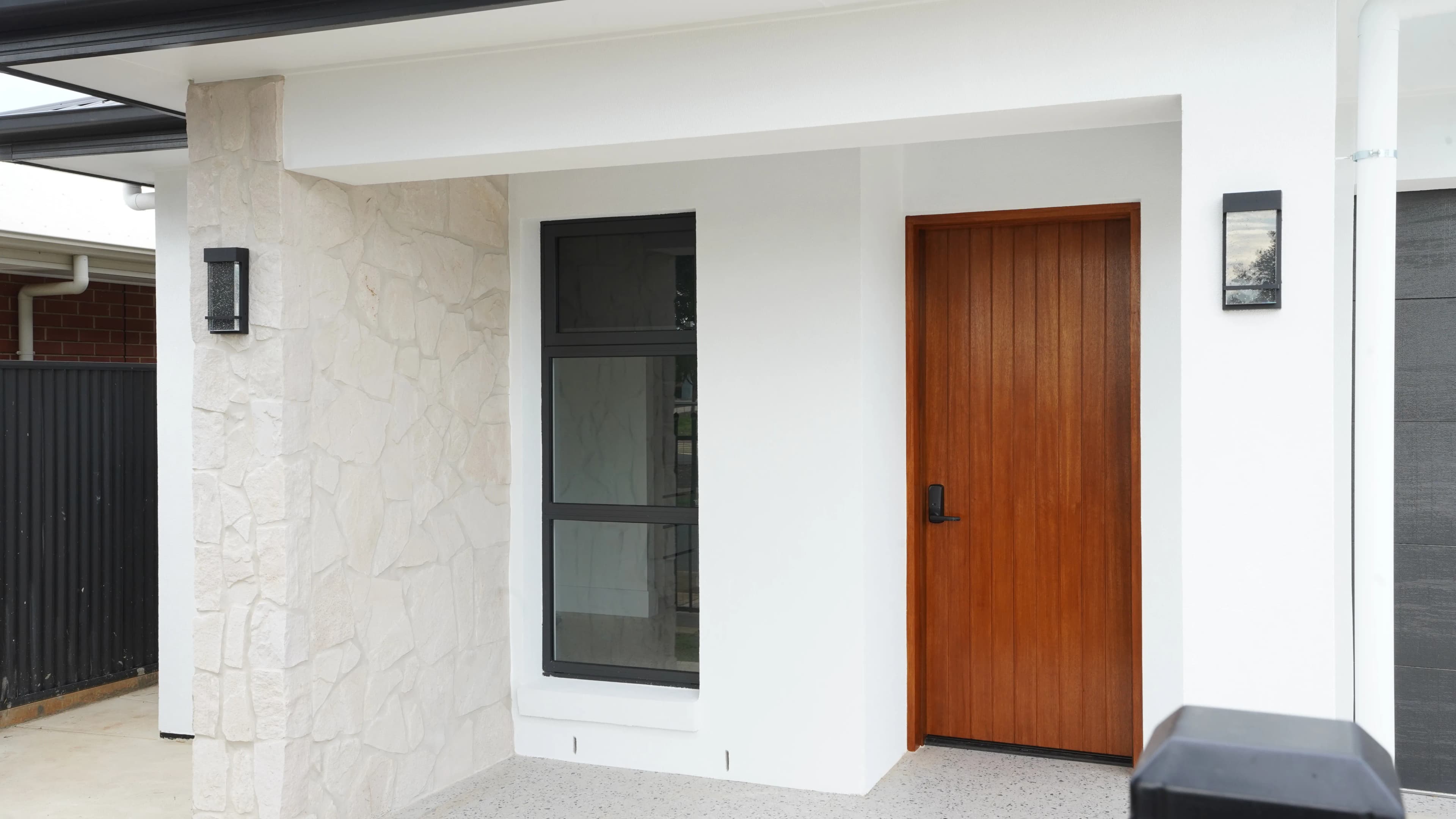 Timber entry door and front window detail